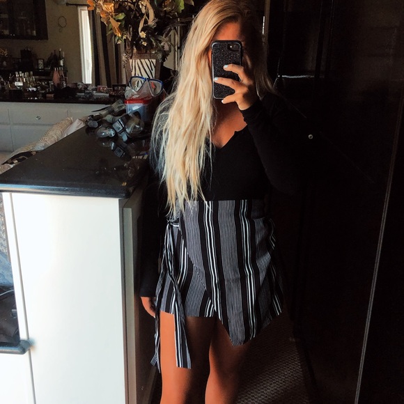 Brandy Melville Dresses & Skirts - Black and white striped front tie skirt